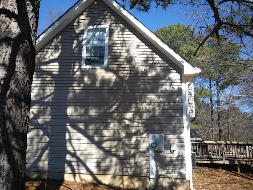 Second elevation of a completed vinyl siding replacement
