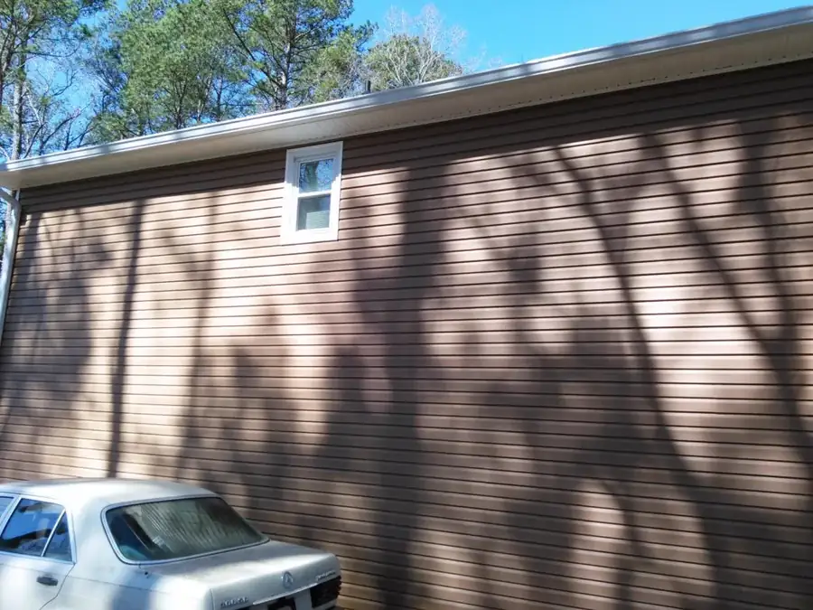 Vinyl siding installed around windows and doors